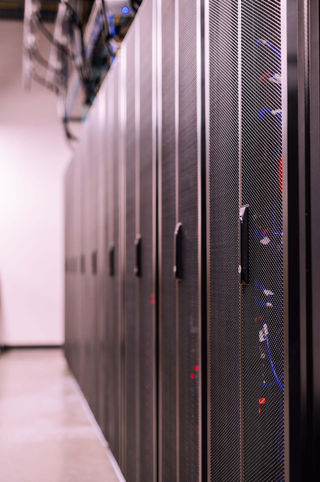 Server rack with network cabling in a data room